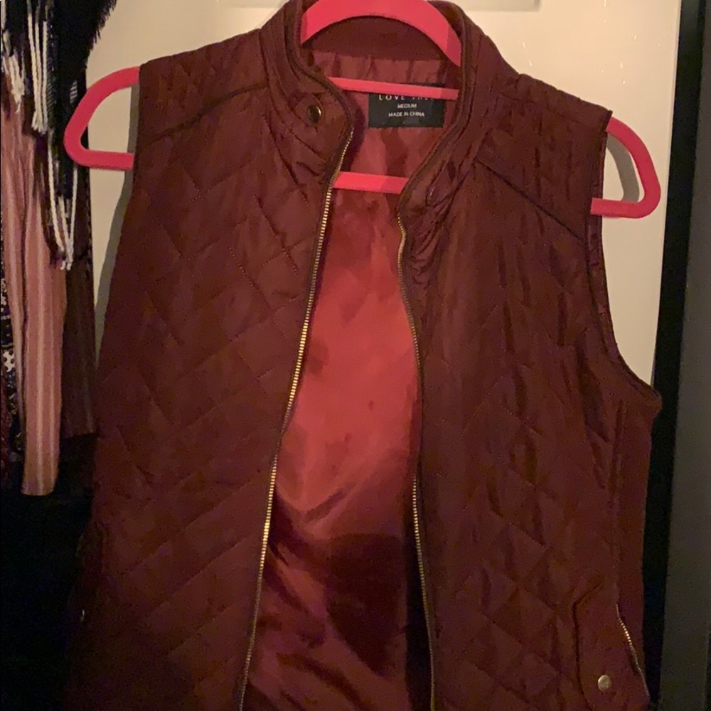 Burgundy vest with gold zipper